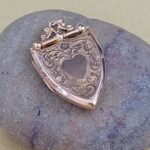 9ct Rose Gold Shield Style Locket from Ace Jewellery, Leeds