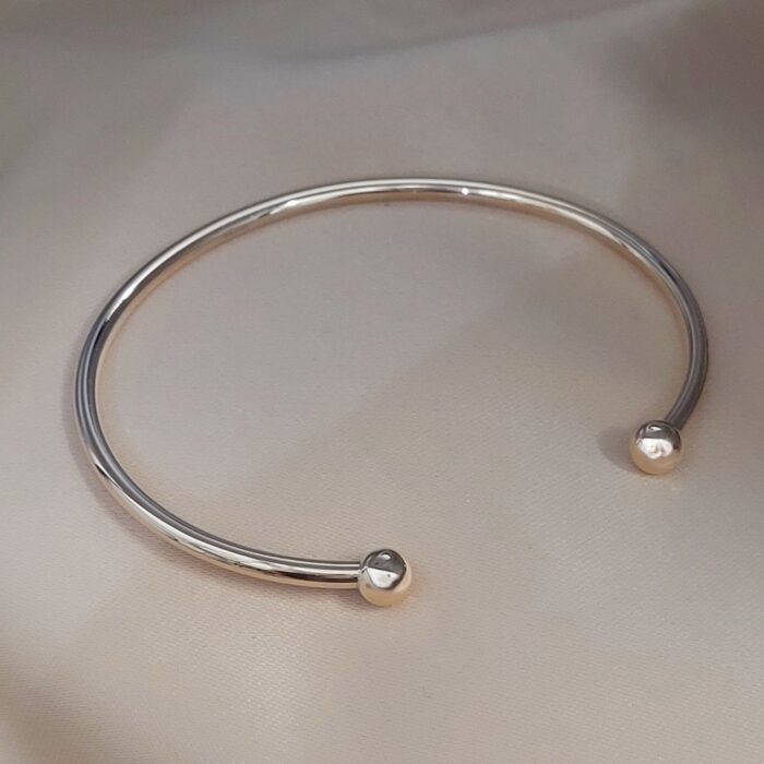 9ct Yellow Gold Solid Torc Bangle from Ace Jewellery, Leeds