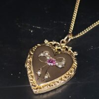 Antique 0.20ct Ruby & Pearl 9ct Yellow Gold Heart Locket Pendant & Chain from Ace Jewellery, Leeds