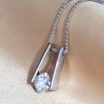 0.82ct Solitaire Diamond Tension-Set Pendant Necklace 18ct White Gold from Ace Jewellery, Leeds