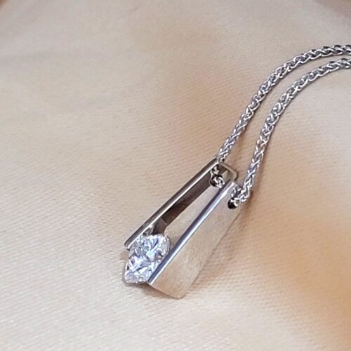 0.82ct Solitaire Diamond Tension-Set Pendant Necklace 18ct White Gold from Ace Jewellery, Leeds