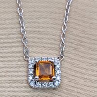 0.57ct Yellow Sapphire & Diamond Halo Pendant Necklace Platinum from Ace Jewellery, Leeds