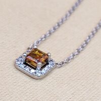 0.57ct Yellow Sapphire & Diamond Halo Pendant Necklace Platinum from Ace Jewellery, Leeds