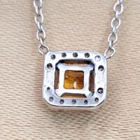 0.57ct Yellow Sapphire & Diamond Halo Pendant Necklace Platinum from Ace Jewellery, Leeds