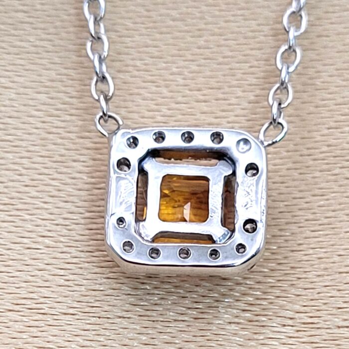 0.57ct Yellow Sapphire & Diamond Halo Pendant Necklace Platinum from Ace Jewellery, Leeds