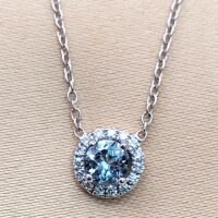 0.65ct Aquamarine & Diamond Halo Pendant Necklace 18ct White Gold from Ace Jewellery, Leeds