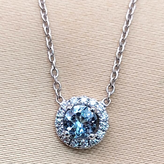 0.65ct Aquamarine & Diamond Halo Pendant Necklace 18ct White Gold from Ace Jewellery, Leeds