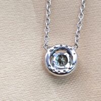 0.65ct Aquamarine & Diamond Halo Pendant Necklace 18ct White Gold from Ace Jewellery, Leeds