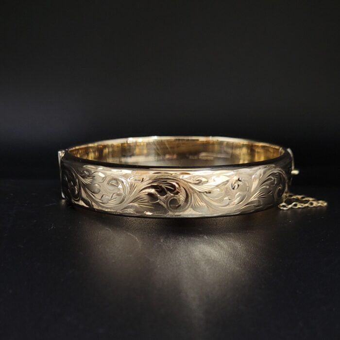 9ct Yellow Gold Half Engraved Hinged Bangle from Ace Jewellery, Leeds