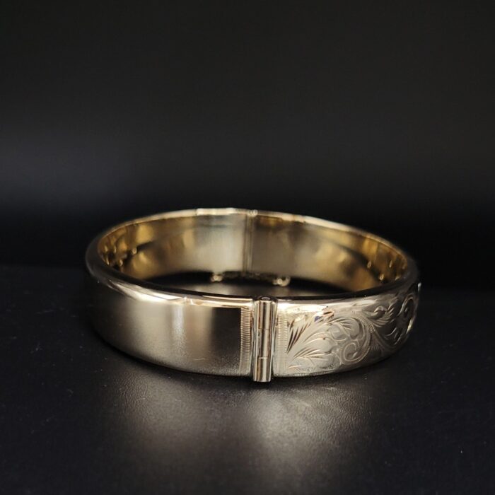 9ct Yellow Gold Half Engraved Hinged Bangle from Ace Jewellery, Leeds