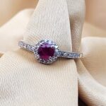 0.65ct Ruby & Diamond Halo Ring 14ct White Gold from Ace Jewellery, Leeds